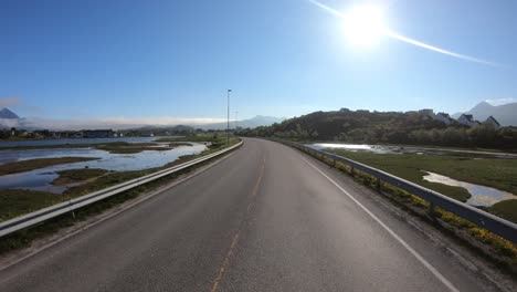 vehicle point-of-view driving a car on a road in norway