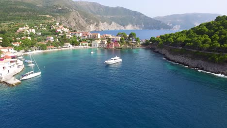 Approaching-drone-shot-of-the-peninsula-of-Agriosiko-Beach,-a-secret-getaway-in-the-island-of-Kefalonia-in-Western-Greece