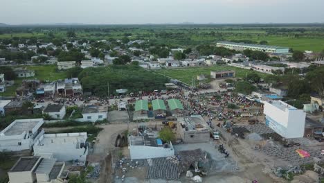 aerial drone footage of a local market in india, asia