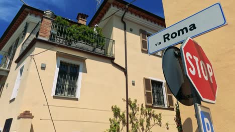 stop sign and street name in sunny cuneo