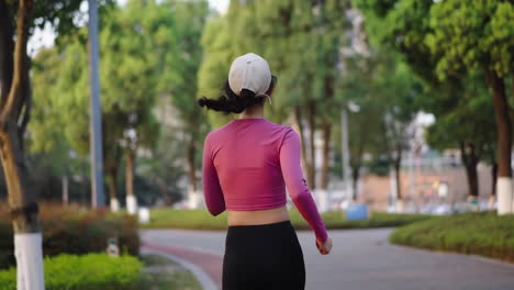 Sportswoman-athletic-female-activewear-is-running-jogging-and-doing-cardio-activity-outdoor-training-in-city-urban,-feeling-healthy-strong,-lose-weight-concept