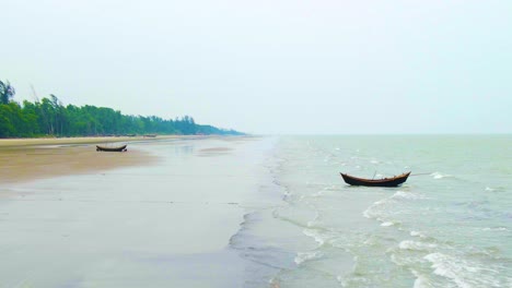 Fishing-Boats-At-Kuakata-Sea-Beach-During-Sunrise-In-Bangladesh,-South-Asia