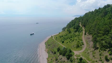 lake shore with boats and beach