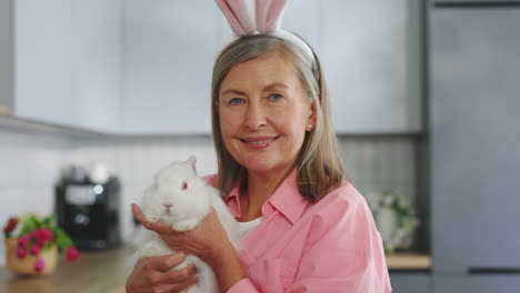 woman and rabbit in kitchen