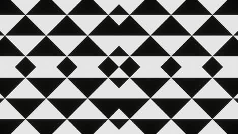 smooth looped animation of black and white triangles and squares
