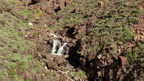 Fantastic-aerial-shot-of-a-small-waterfall-caused-by-the-heavy-rains-of-Cyclone-Hermine-on-the-island-of-Gran-Canaria-recently