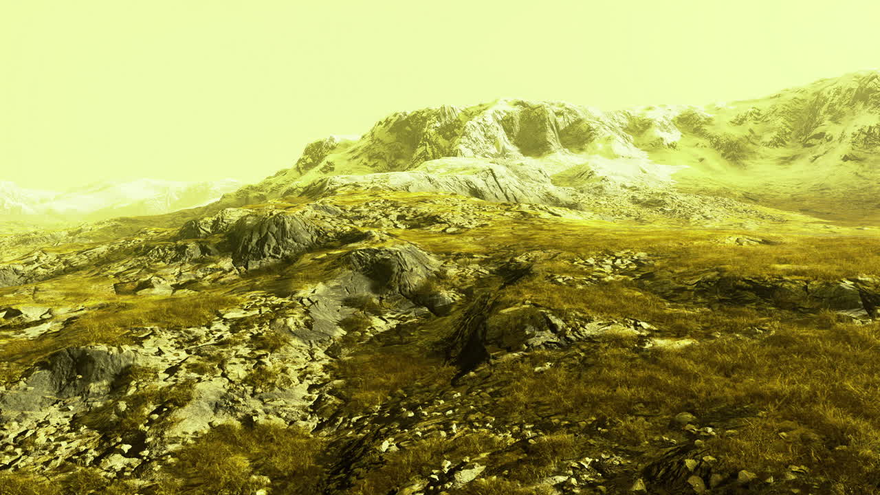Mountain landscape under a yellow sky during serene daylight hours