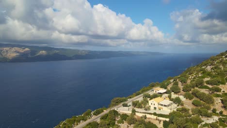 house on top of a mountain by the ionean sea