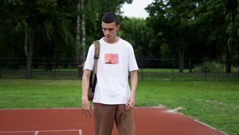 Young-teenager-playing-with-basketball