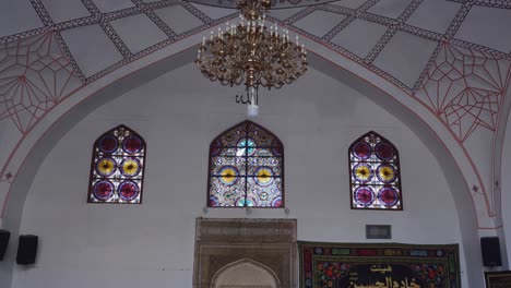 Tilt-down-from-dome-ceiling-to-rug-floor-in-Blue-Mosque-in-Armenia