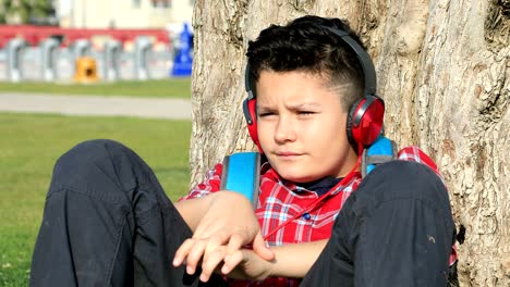 young boy using smartphone