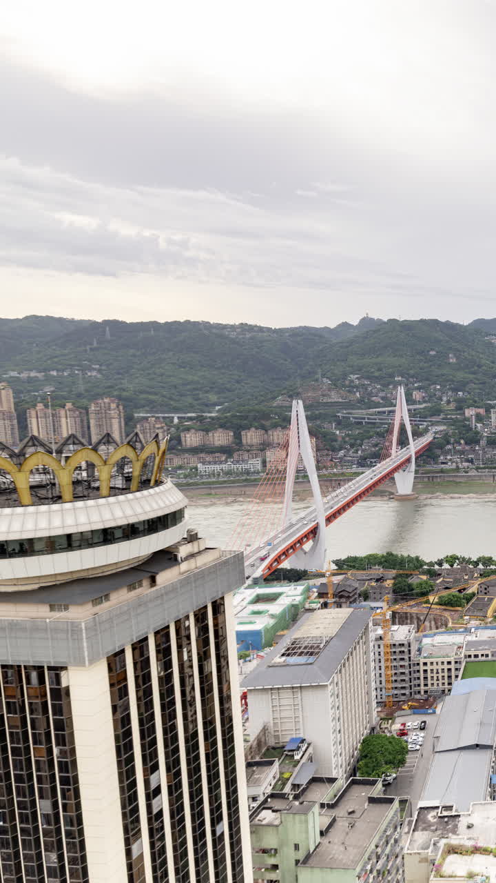 CHONGQING, CHINA - 18 MAY 2025 : Timelapse of the amazing Chongqing city skyline in stormy weather in vertical