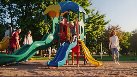 happy family at the park playground