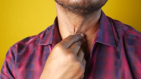 man checking his throat