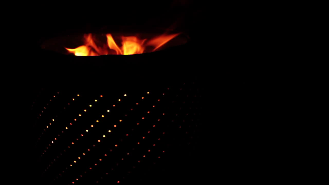 Fire burning in a metal container