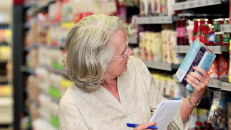 senior woman shopping in grocery store