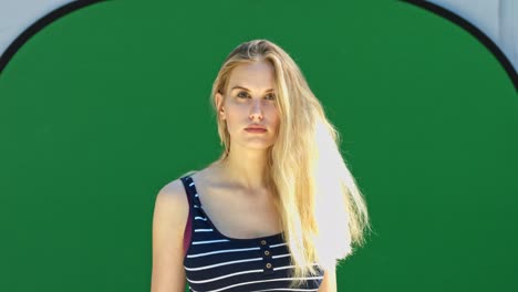 beautiful blond woman on chroma key green background