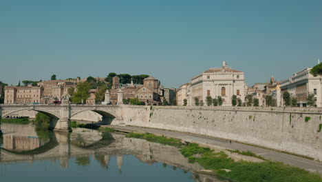 rome cityscape with tiber river and bridges