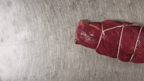 raw tied beef roast