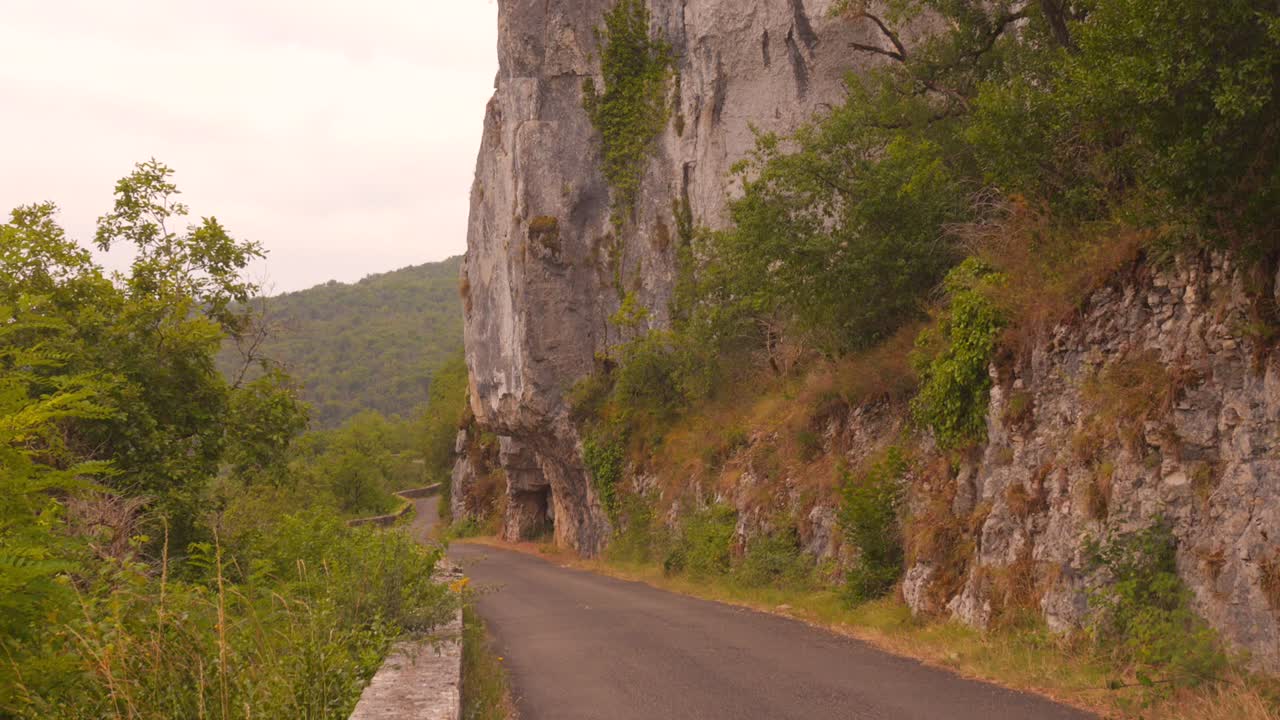 View Of Cliff And Road In Causses du Quercy Unesco Geopark In France