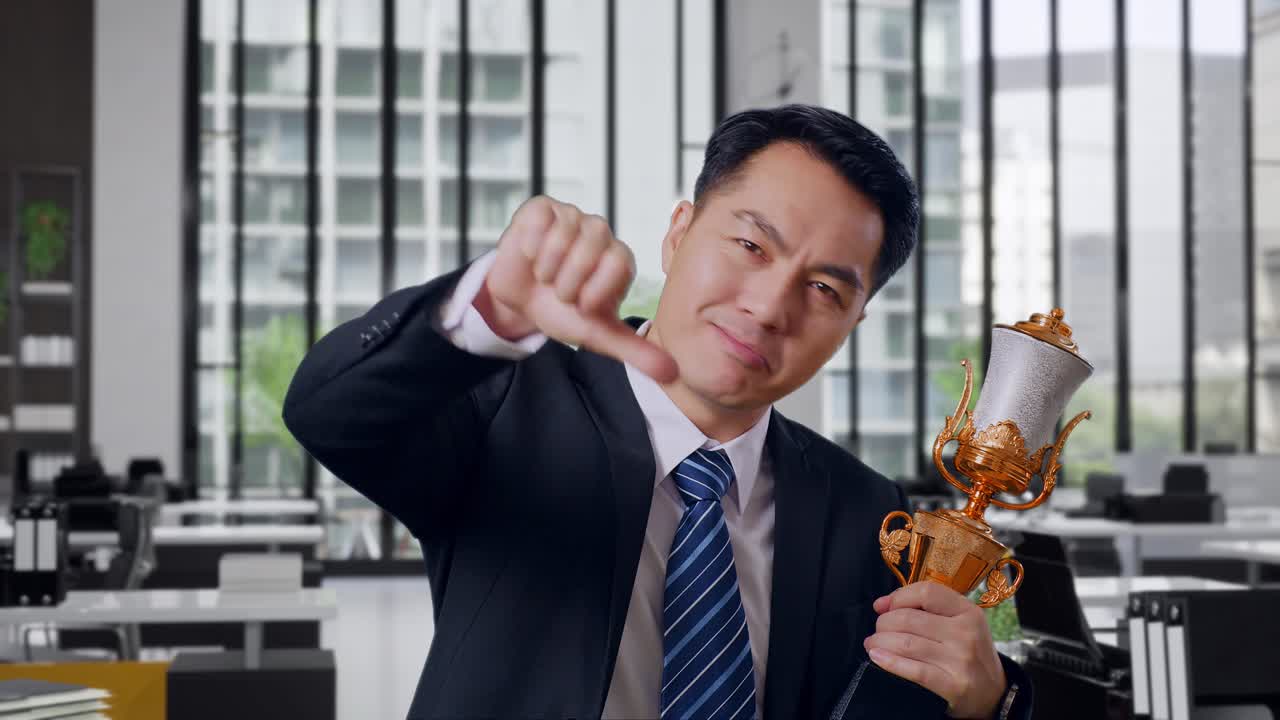 Businessman Disappointed with Trophy