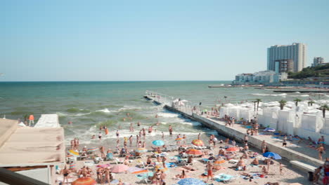 people at the beach in arcadia, odessa.