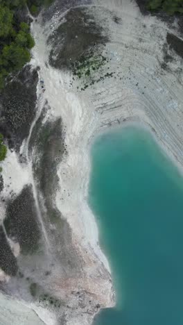 stunning aerial views of turquoise lake and arid shoreline