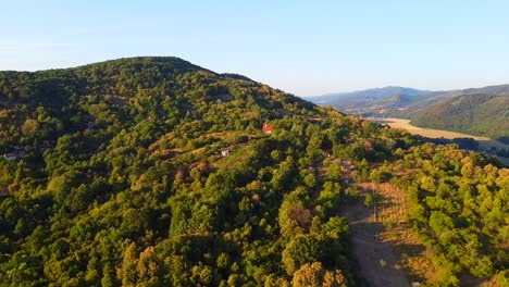cinematic drone shot of hills and green nature in slovakia