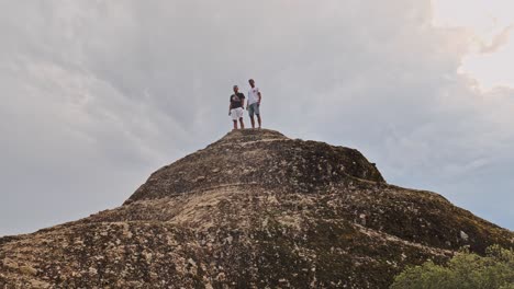 two men on a mountaintop