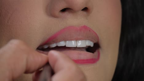 a makeup artist traces the lips of the model with a cosmetic pencil a makeup artist traces the lips of the model with a cosmetic pencil high quality footage