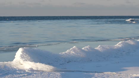 In-the-winter,-stones-are-icy-on-the-sea-shore