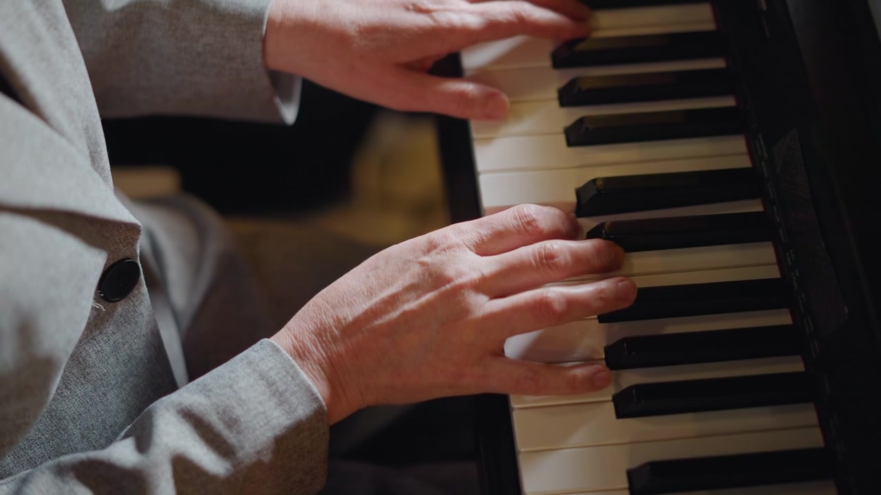 Elderly hands on piano keys, closeup of seasoned musician teacher giving lesson in cozy school studio, gentle ivory touch, focus on finger technique and practice, warm nostalgic atmosphere conveying