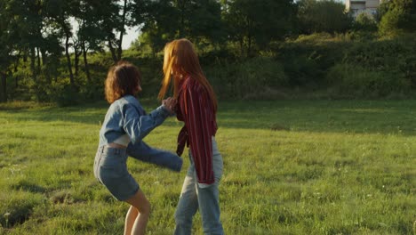 two friends playing in a field