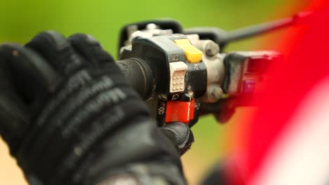 a racer switches on his atv