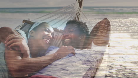 animación de una feliz pareja afroamericana en una hamaca en la playa sobre el paisaje marítimo
