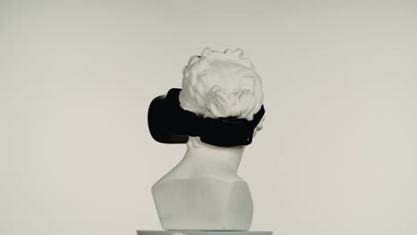 virtual reality headset on a classical bust