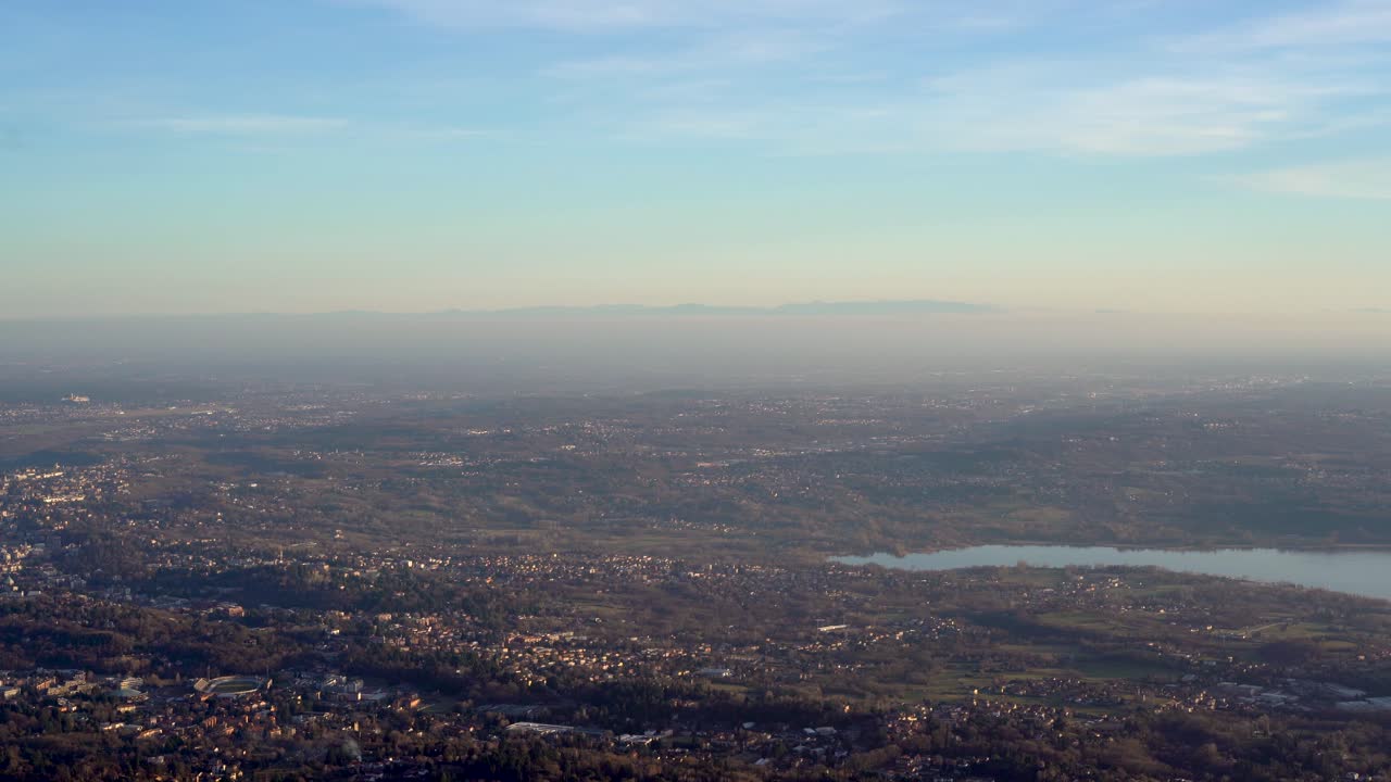 Aerial Panning shot panorama of Varese Campo dei Fiori at dusk, Italy