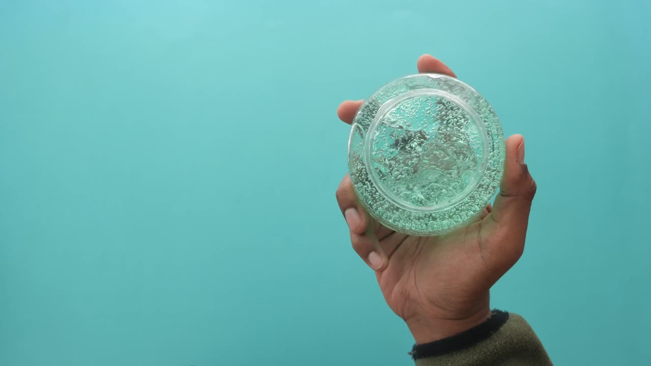 Hand sanitizer gel held in a hand