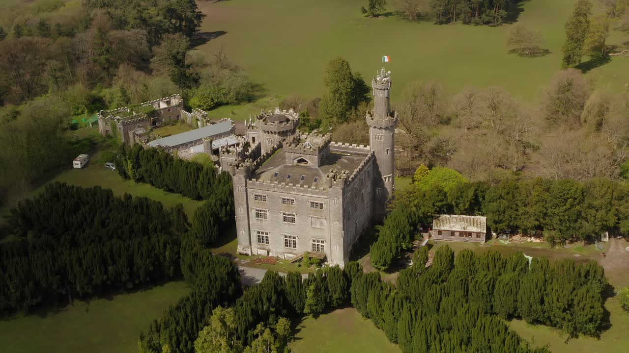 Establishing shot of majestic Charleville Castle on a sunny day