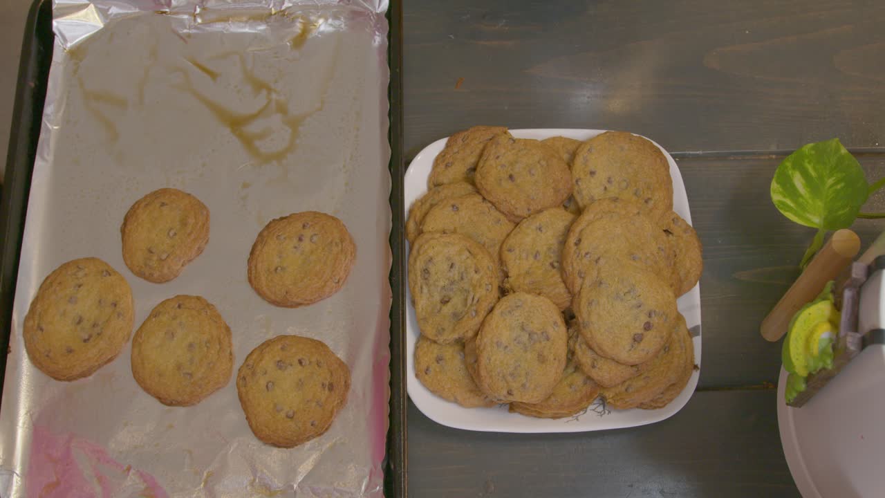 Indulge in a mouthwatering world of freshly baked cookies with this delightful stock video