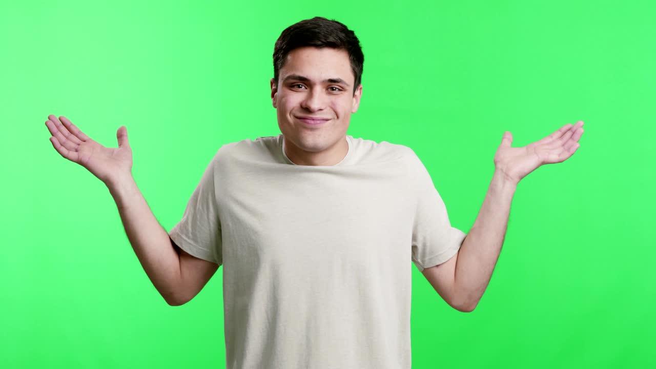 Young man raising his hands and shaking head no