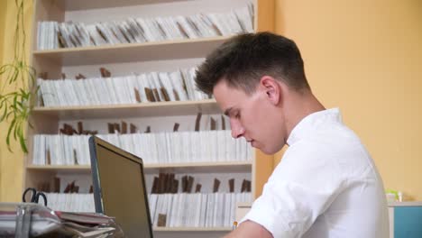 young intern studies at the clinic. online education concept