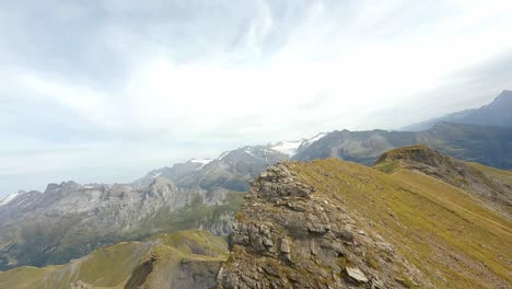 Flying-down-from-a-mountain-summit-to-the-valley