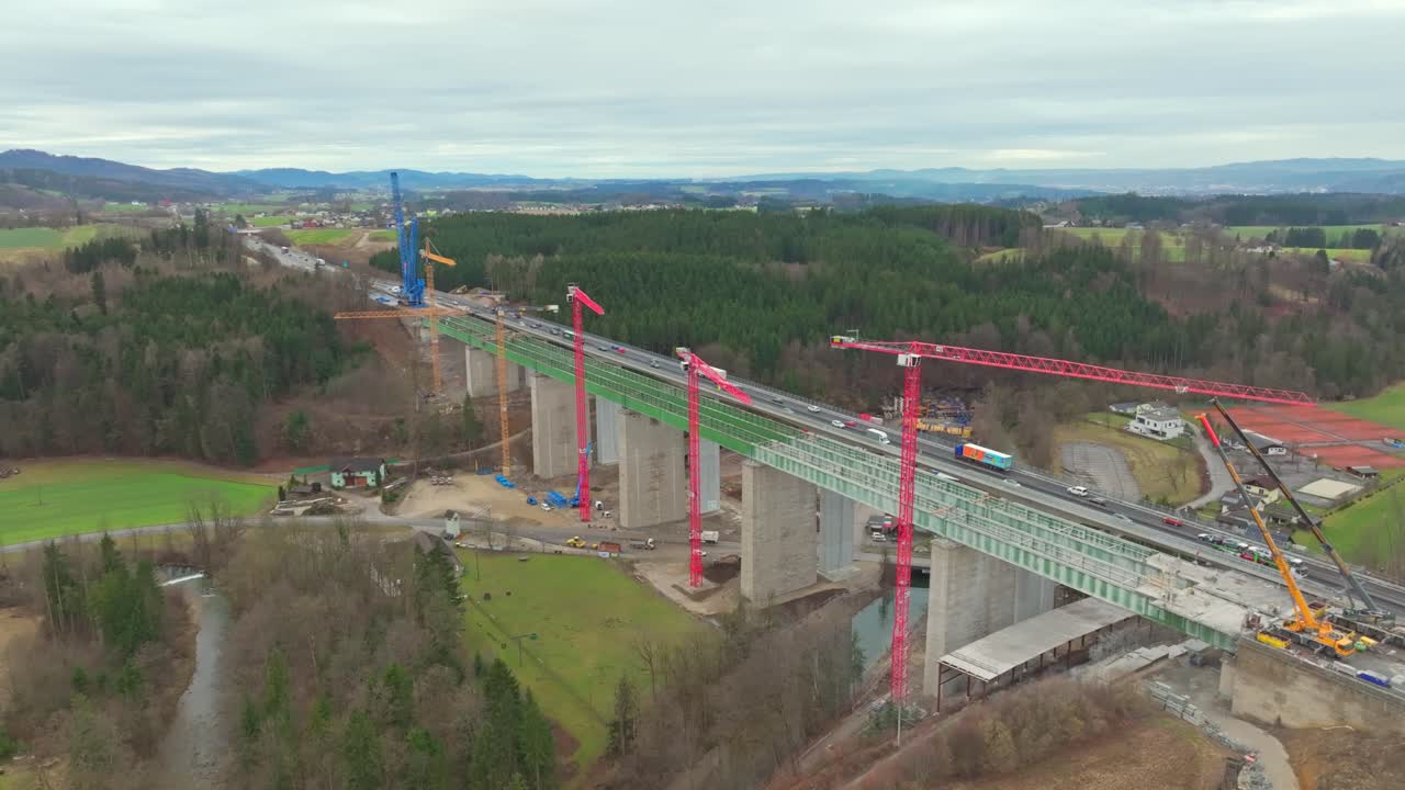 Industrial Cranes At The New Highway Bridge Adjacent To Aurach Bridge In Austria