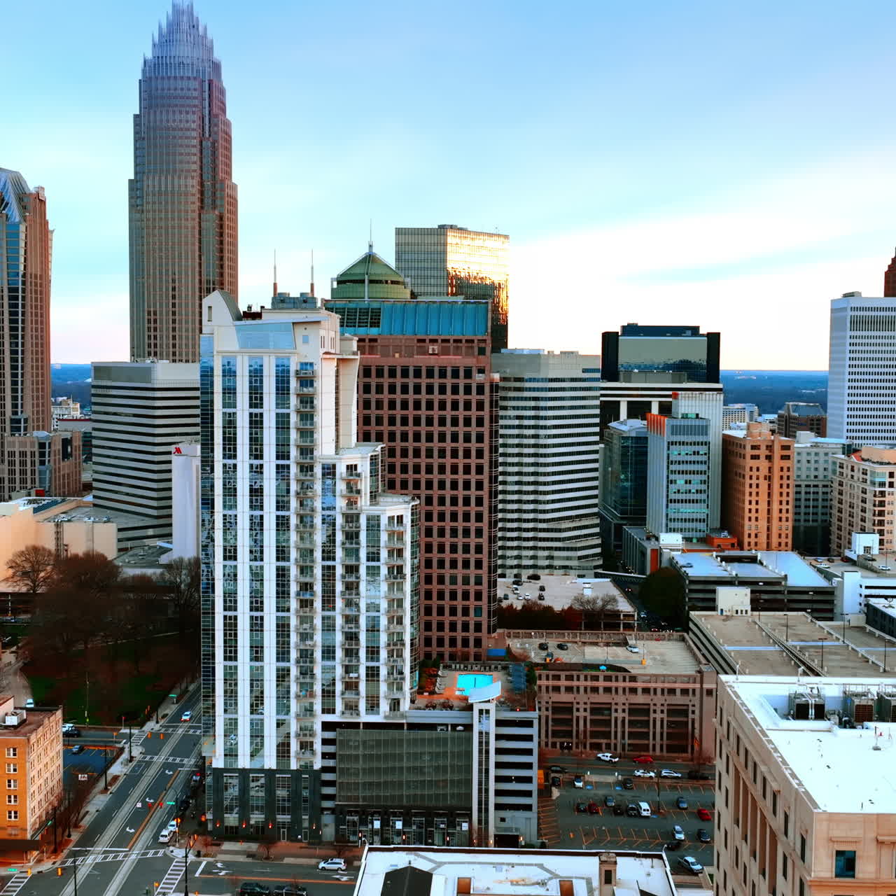 Gorgeous view of the stunning group of skyscrapers in the downtown of American city. Scenery of Charlotte, North Carolina, USA from aerial perspective.