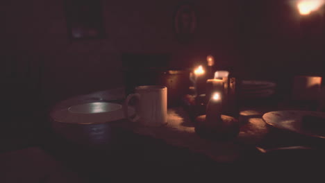 table setting in candlelight at night