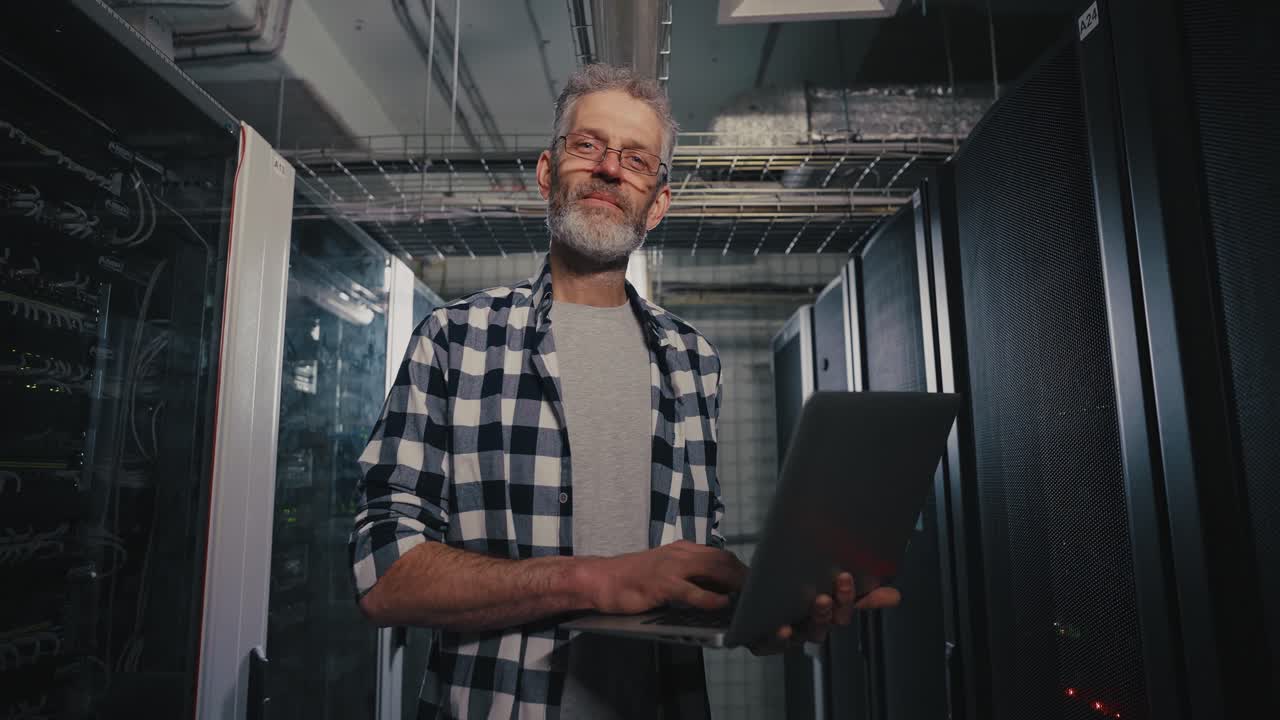 Technician working in a server room
