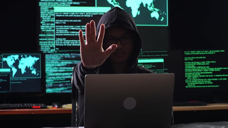 Hacker Showing Stop Gesture