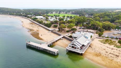 drone footage captures point lonsdale's scenic pier and coastline under soft daylight, highlighting the tranquil coastal environment