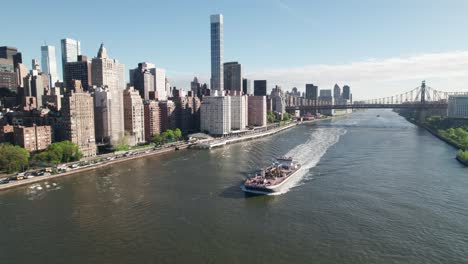 Large-barge-on-New-York's-east-river,-industrial-urban-scene